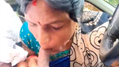 Aunty sucking a dick in a car outdoor Hindi sex video